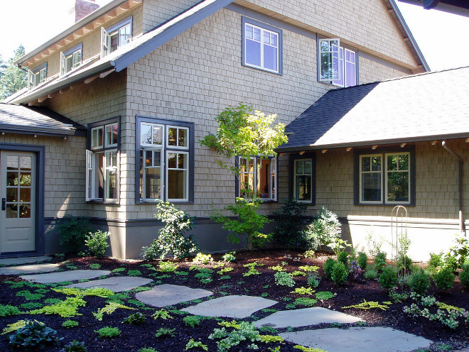 Aluminum clad wood windows. The exterior walls are western red Cedar shingles above a stucco wainscot, with aluminum clad wood windows and a composition roof. #Aluminumcladwoodwindows David Edrington, Architect