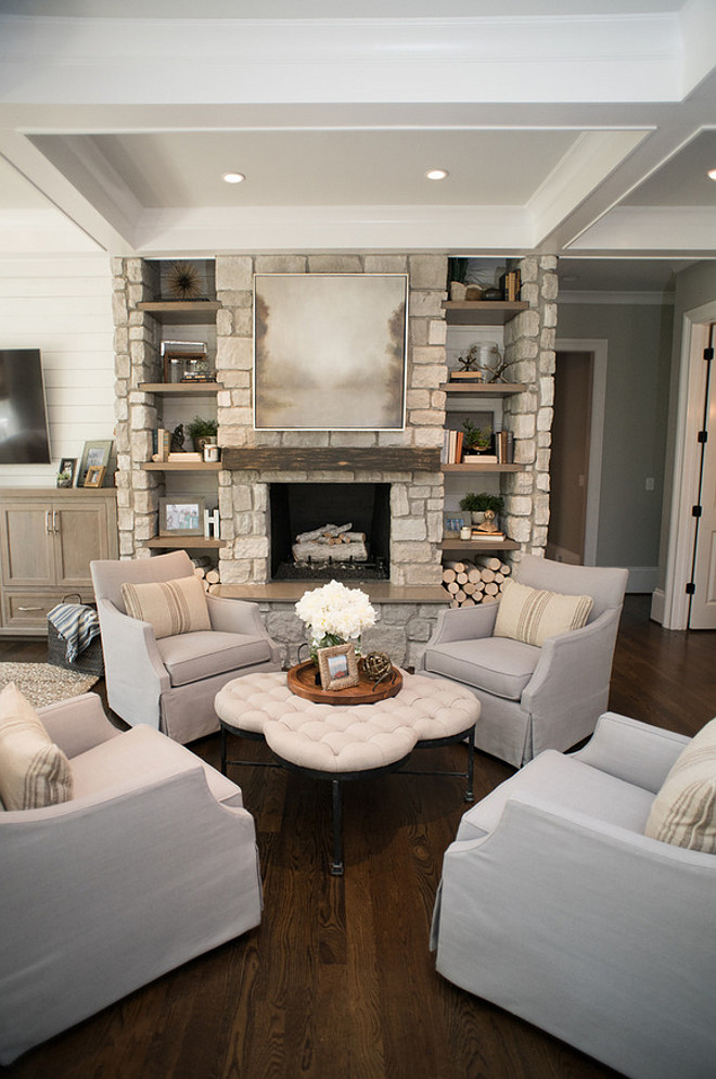 Living room Chairs. Four chairs together creates an inviting sitting area by the fireplace. Living room chairs are Chairs are Azriel swivel glider from Sam Moore furniture. #Livingroom #Chairs #Livingroomchairs Artisan Design Studio