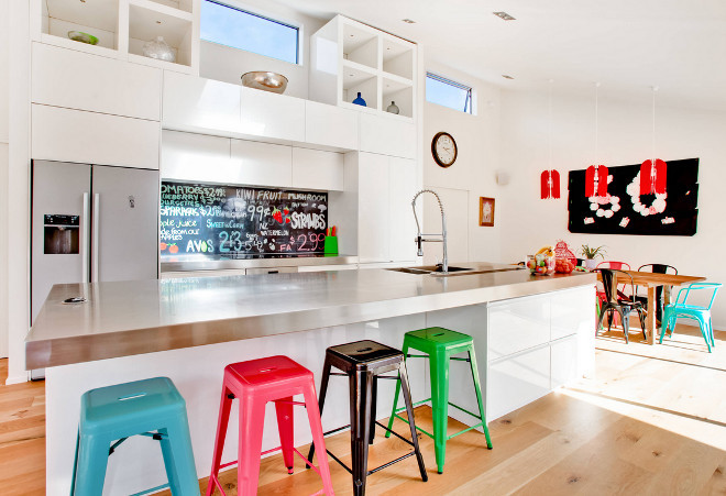 Tolix counterstool. Tolix counterstool. White kitchen with colorful Tolix counterstools and chairs. Tolix counterstools. Tolix counterstool #Tolixcounterstool Lucy G Creative NZ Photography & Splashbacks