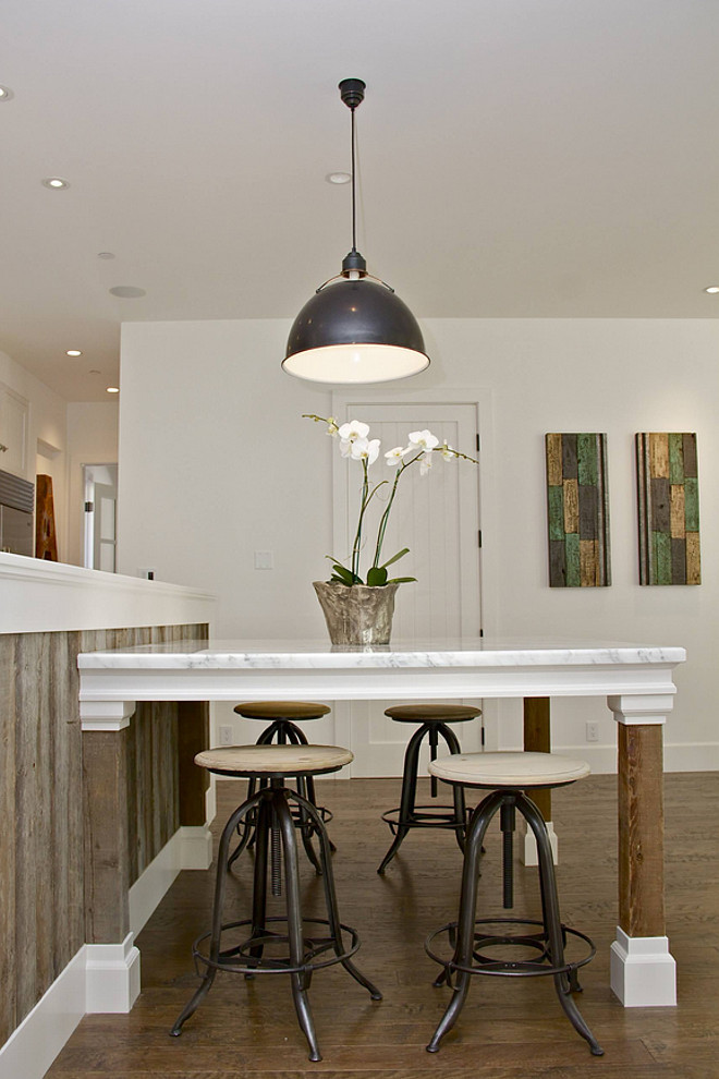 Kitchen island table . Custom marble top and reclaimed wood kitchen table supported off the island. Kitchen island table ideas. Kitchen island table #Kitchenislandtable #Islandtable #kitchenislandwithtable KCS, Inc