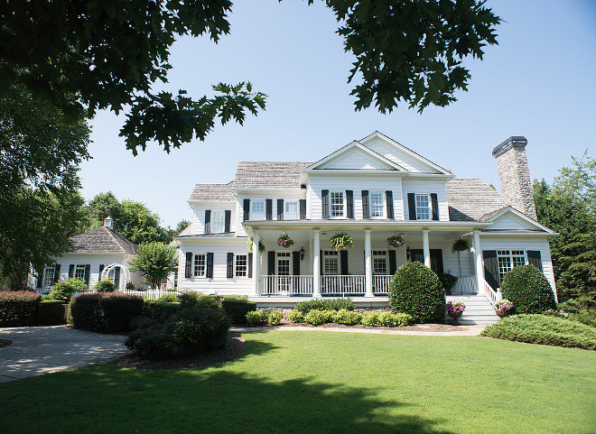 White home with Black shutters. Artisan Design Studio