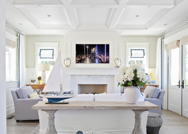 Living room. This living room feature subtle colors and subtle coastal decor. Notice the coffered ceiling and the gentle wall color. #livingroom Patterson Custom Homes. Interiors by Trish Steele, Churchill Design.