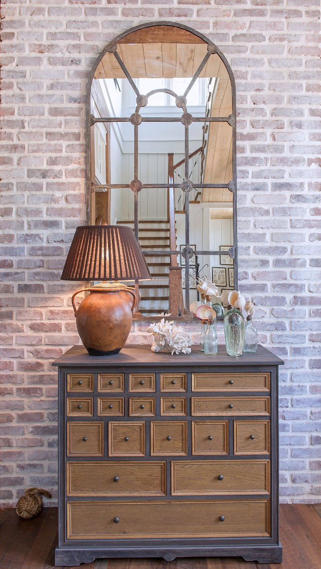 Exposed Brick Walls. Each reclaimed brick used in this home was whitewashed by hand. Whitewashed brick. #brickwalls #whitewashedbrick #exposedbrickwall Interiors by Courtney Dickey and T.S. Adams Studio.