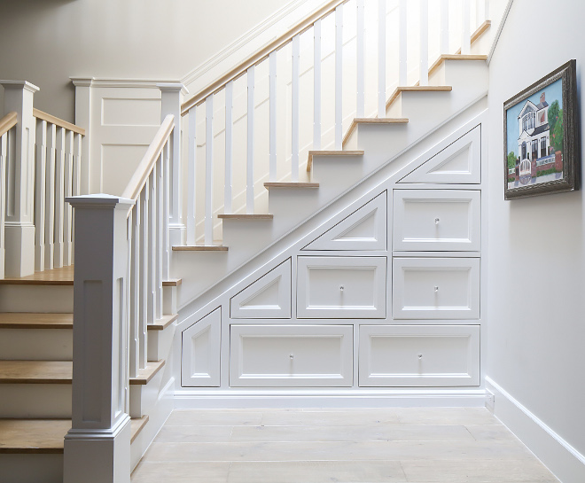 Under the stairs drawer storage ideas. This basement is full of great ideas! Imagine using the lost space under your stairs to store anything from toys to Christmas decorations, everything organized in drawers like these! Under the stairs drawer storage. Great usage of space. Under the stairs drawer storage ideas. #Underthestairsdrawerstorage ideas #storage Patterson Custom Homes. Interiors by Trish Steele, Churchill Design.