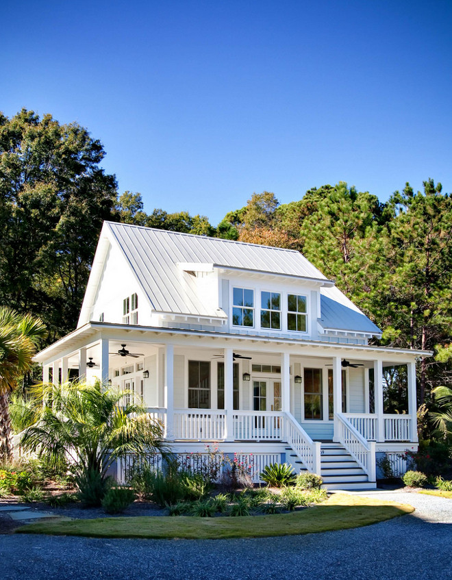 Farmhouse exterior with metal roof, white siding and wrap-around porch. Farmhouse exterior with metal roof, white siding and wrap-around porch #Farmhouse #Famrhouseexterior #metalroof #whitesiding #wraparoundporch Artistic Design and Construction, Inc