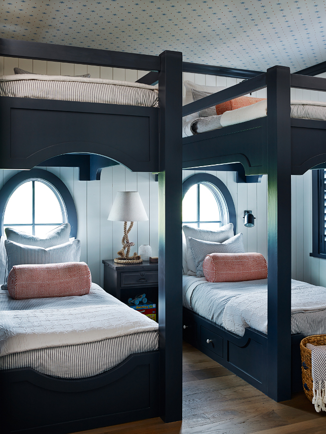 Navy Bunk Beds. Bunk room navy bunk beds. Painted bunk beds. Stunning bunk room with oval windows and bunk beds painted in navy. #Bunkroom #BunkBed #NavyBunkRoom #Navy #Navypaintcolor #Navybunkbeds #Navybunk #Navyrooms #navypaintcolor #navyinteriors T.S. Adams Studio, Architects