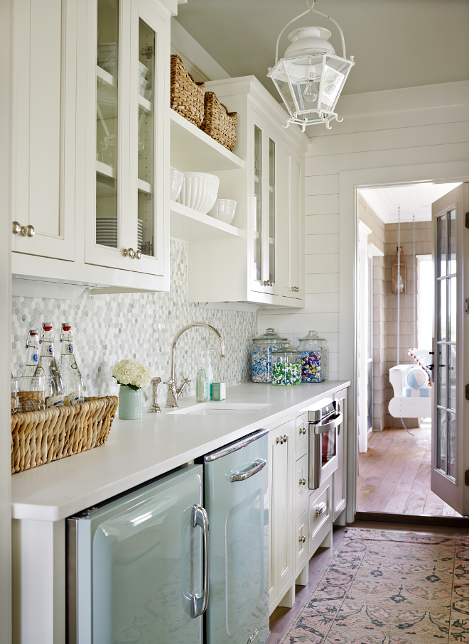 It’s so easy to fall in love with this butler’s pantry, especially when you notice the retro dishwasher and the retro beverage fridge. Winners! The retro dishwasher is from Big Chill. Big Chill Retro Dishwasher – from $1,695.00 Oh, did you notice that swing porch? We can’t miss that…