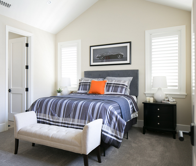 The bedroom decor is quiet and perfect for a teen boy. I like the quiet and masculine decor found here. This room is great for a teenage boy. Patterson Custom Homes. Brandon Architects, Inc.