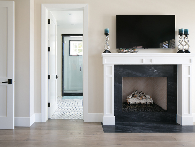 Marble fireplace surround. The fireplace slab is Bardiglio Marble with a 2" miter edge detail. #Marblefireplacesurround #fireplacesurround #marble #BardiglioMarble Patterson Custom Homes. Brandon Architects, Inc. 