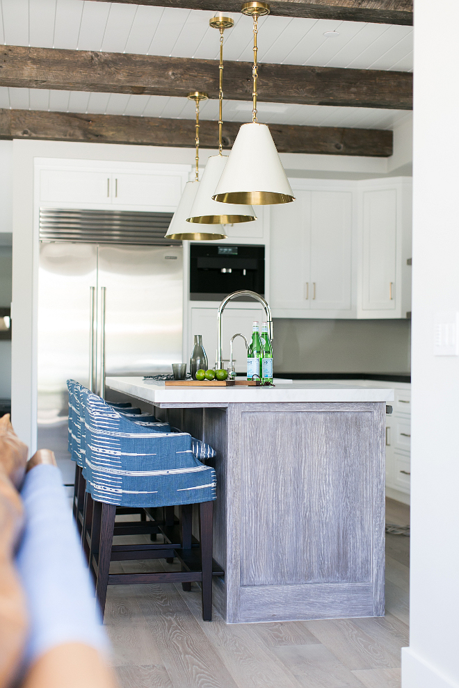 Gray wood- whitewashed kitchen island. Driftwood kitchen island. Kitchen island is Rift Sawn White Oak island custom made by the builder's local finish carpenter. #Graywood # whitewashedkitchenisland #driftwoodisland #driftwoodkitchenisland #RiftSawnWhiteOak #RiftSawnwood #RiftSawnkitchenisland Patterson Custom Homes