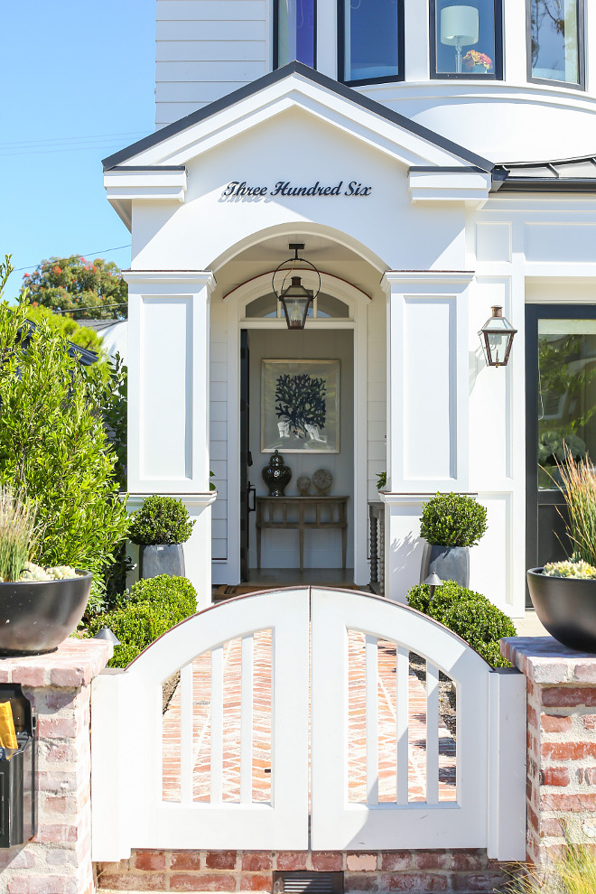 House Number. Cursive House Numbers: The builder have a private vendor that laser cuts the letters out of plate steel, which then is powder coat and installed on standoffs to give the shadow effect. Patterson Custom Homes. Interiors by Trish Steele, Churchill Design. 