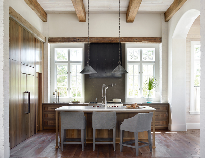 Leathered Limestone. Kicthen leathered Limestone countertop. The kitchen backsplash and perimeter countertop is Millie Brown leathered Limestone. #leatheredLimestone #limestone #limestonecountertop #limestonebacksplash #kitchen #countertop #backsplash #MillieBrownLimestone Interiors by Courtney Dickey of TS Adams Studio