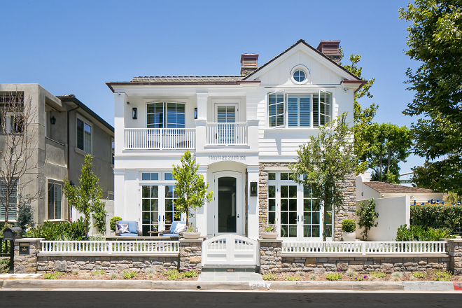 Home Exterior siding and stone color. The siding paint is Dunn Edwards White (DEW380) and the stone is El Dorado York Limestone. Home Exterior paint color. Home exterior stone. #Homeexterior #exterior #sidingpaintcolor #exteriorpaintcolor #exteriorstone Built by Patterson Custom Homes. Architect: Brandon Architects, Inc.