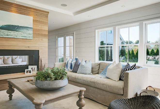 beach home beach style blue pillow coastal decor entertain linen couch Nantucket natural open floor plan shiplap siding two way fireplace wood coffee table Hanley Development.