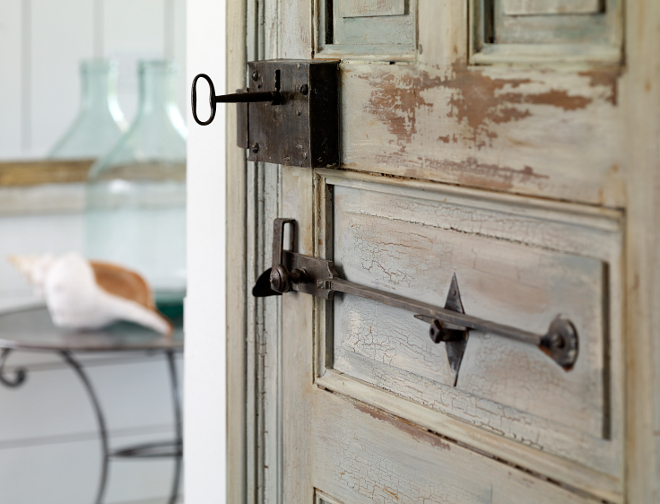 Antique door with antique hardware. An antique door with antique hardware adds some patina to this foyer. Antique Door. Antique Door Hardware Ideas. Antique Door. Antique Door Hardware Ideas #AntiqueDoor # AntiqueDoorHardware Interiors by Courtney Dickey of TS Adams Studio