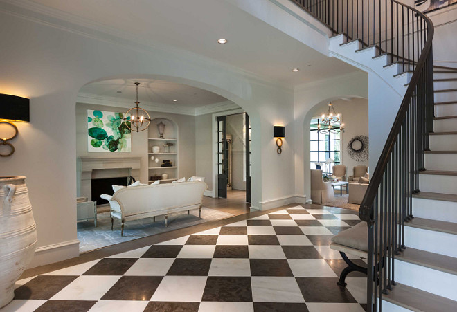 Black and white marble foyer floor tiles. Black and white marble foyer floor tiles. Black and white marble foyer floor tiles. Elizabeth Garrett Interiors