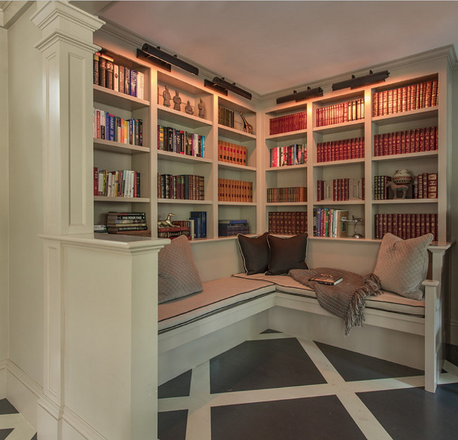 Cozy Reading nook with built-in bookcase and L-shaped banquette-style seats with cushions. #readingNook #nook #builtins #bookcase #banquettecushions #banquette #windowseat Siemasko + Verbridge