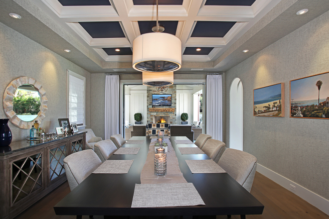 Dining Room Buffet. This dining room also features a beautiful Zinc top buffet with antique glass. Wallpaper is a Philip Jeffries grasscloth wallpaper. #buffet #diningroom Patterson Custom Homes. Interiors by Trish Steele of Churchill Design. 