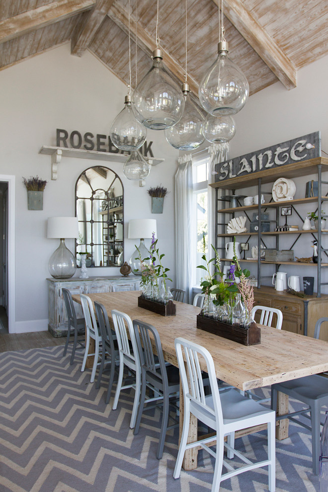 Dining room. Farmhouse Coastal Dining Room. Farmhouse Coastal Dining Room with whitewashed ceiling planks, jar pendant lights and farmhouse table. #Farmhouse #Coastal #DiningRoom #whitewashedceiling #planks #jarpendantlights #farmhousetable Heritage Homes of Jacksonville. Villa Decor & Design.