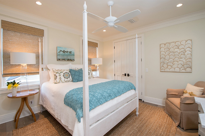 Coastal Bedroom furniture and decor. This guest bedroom feels peaceful with its soothing coastal colors. The bed and side tables are from Noir Furniture. Bedding is from Coadarus. Lamps are Barbara Cosgrove. Chair is from Lee Industries and jute rug is from Classic Home. #coastalbedroom #bedroomfurniture #bedroomdecor Interiors by Courtney Dickey of TS Adams Studio.