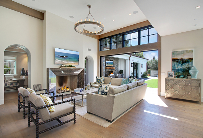 Living Room large chandelier. Living room large chandelier is Visual Comfort's Ralph Lauren extra-large chandelier with Edison Bulbs. #Livingroom #largechandelier #chandelier # RalphLaurenextralargechandelier #EdisonBulbs Patterson Custom Homes. Interiors by Trish Steele of Churchill Design. 