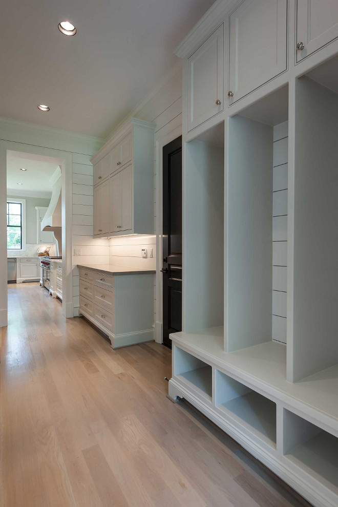 New mudroom project. Mudroom with shiplap walls, white oak hardwood floors and custom cubbies. #mudroom Elizabeth Garrett Interiors