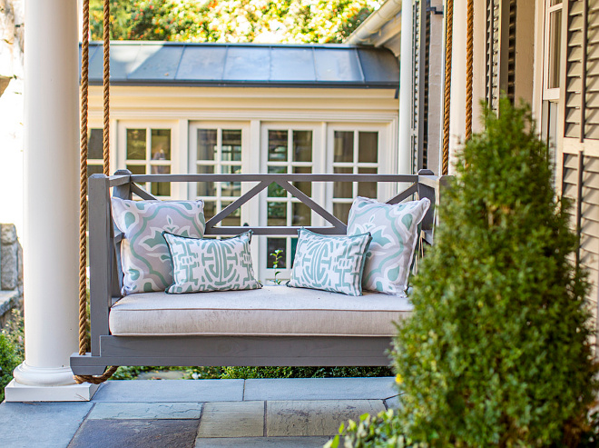 Porch Swing. Gray porch swing. Porch swing with pillows and linen cushion. Porch swing #Porch #swing #Porchswing #Porchswingpillows #Porchswingcushion #GrayPorchswing Tillman Long Interiors.