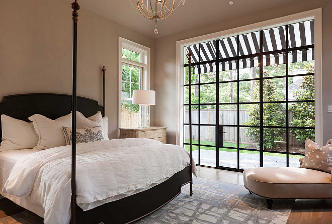 Steel Window and Doors. Bedroom Steel Window and Doors. Bedroom with Steel Window and Doors opening to garden. #SteelWindow #SteelDoors #bedroom Elizabeth Garrett Interiors. Connie Anderson Photography.