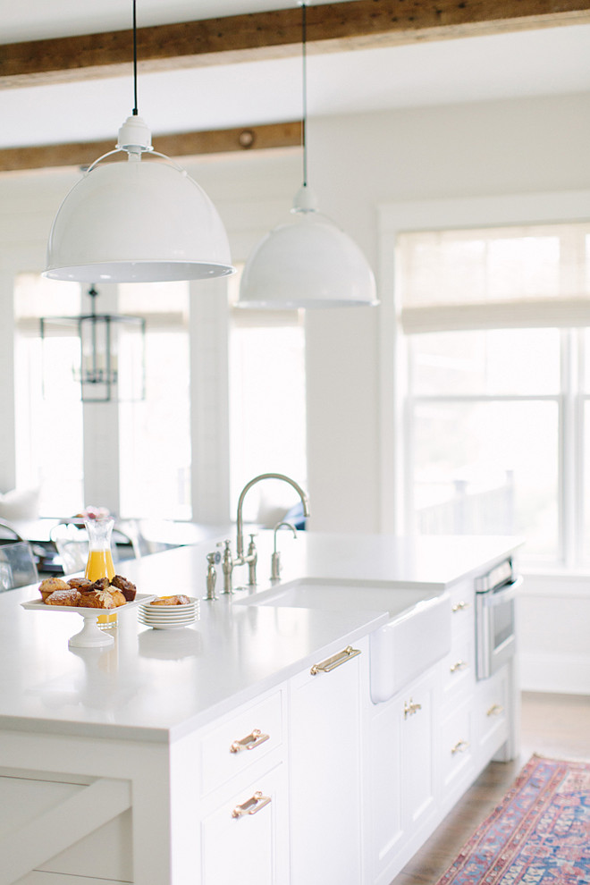 Thomas O'brien large Eugene pendant. White pendants are Thomas O'brien large Eugene pendant. #ThomasObrienLighting #largeEugenependant Kate Marker Interiors.