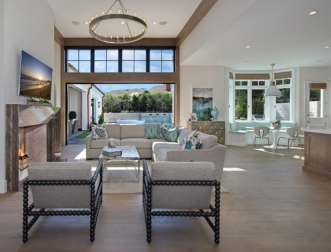 Transitional Living room with light wood floors and spindle chairs. Chairs are from Bernhard Furniture. #livingroom #chairs #lightwoodfloors Patterson Custom Homes. Interiors by Trish Steele of Churchill Design. 