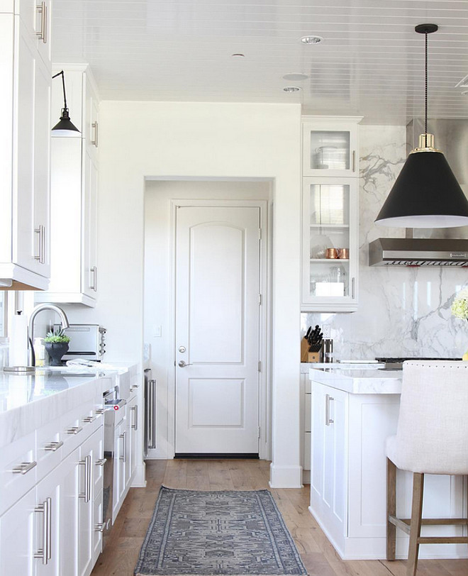 White kitchen lighting Ideas. White kitchen with black and brass pendants. Kitchen lighting is by Rejuvenation. Kitchen lighting. #Kitchenlighting #Kitchenlight #Kitchenlightingideas Becki Owens.