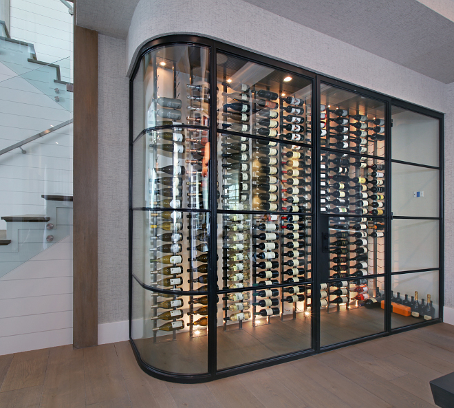 Wine Cellar. Beautiful custom black steel and glass wine cellar. #blacksteelandglasswinecellar #winecellar Patterson Custom Homes. Interiors by Trish Steele of Churchill Design. 