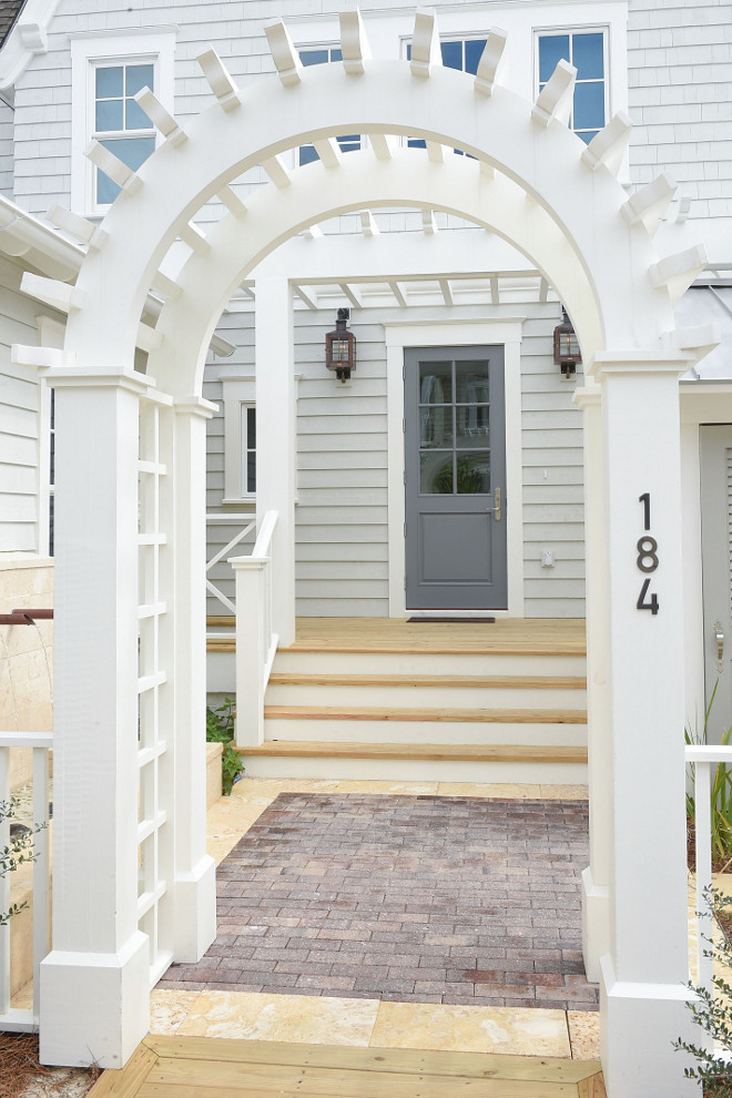 Front Entry. Coastal Home Front Entry. Front Entry Ideas. Front Entry Door. Front Entry Pathway. Front Entry Lighting. Front Entry Flooring. Front Entry Paint Color. Front Entry #FrontEntry #CoastalHomeFrontEntry #FrontEntryIdeas #FrontEntryPathway #FrontEntryLighting #FrontEntryPaintColor #FrontEntryDesign #FrontEntryFlooring Interiors by Courtney Dickey of TS Adams Studio.