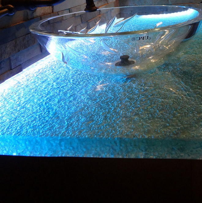 Glass Countertop. Thick Glass Countertop. This countertop is made with Aqua Clear 1 1/2″ glass, with Melting Ice texture and textured edges. #thickglass #countertop #Glasscountertop CBD Glass Studios