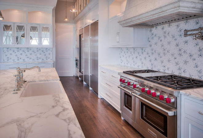 Kitchen countertop and backsplash. Kitchen island and perimeter counters are Calcatta marble. Backsplash is Custom Waterjet Backsplash in Marble and Thassos. #Kitchen #Countertop #Backsplash #Marble #Calcatta #WaterjetBacksplash