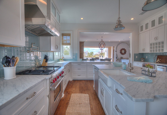 White kitchen with blue backsplash tile. White kitchen with blue backsplash tile ideas. White kitchen with blue backsplash. #Whitekitchen #bluebacksplashtile ##bluebacksplash #bluetile Chi-Mar Construction