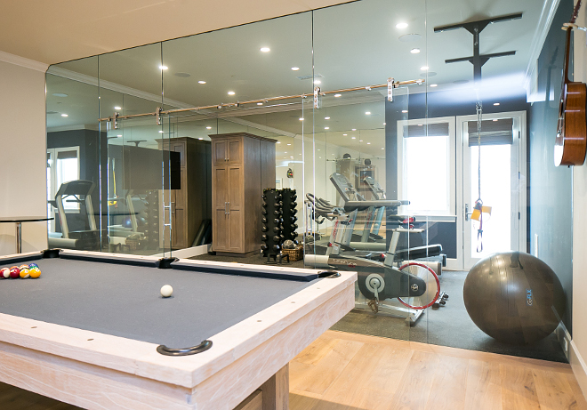 Basement Gym. Basement Gym Design. The basement also features an amazing gym with full wall of glass. #Basement #gym Brandon Architects, Inc. Churchill Design. Legacy CDM Inc.