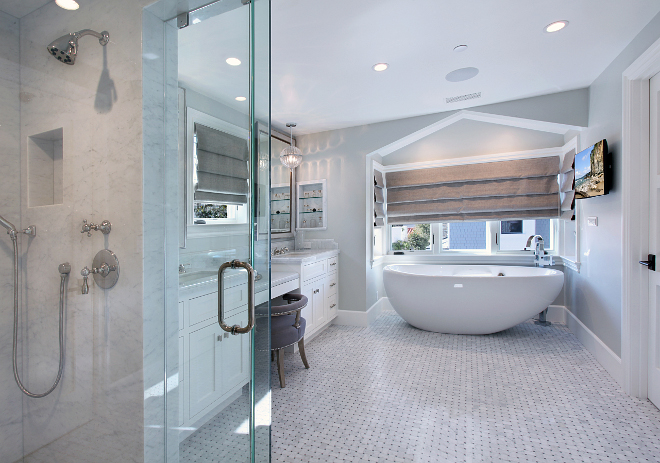 Bathroom. Master bathroom flooring This spacious bathroom features heated floors. Flooring is white basket weave with grey dot honed. #bathroom #masterbathroom #heatedfloors #Flooring #floortiles Patterson Custom Homes