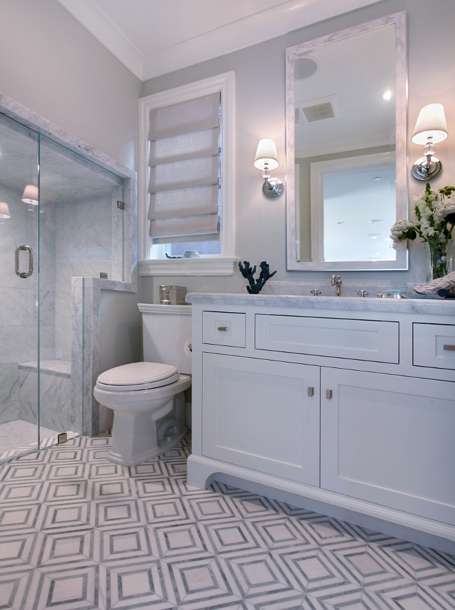 Bathroom Tiling. Bathroom tiling. Marble tiling bathroom. Bathroom marble tilingg Shower Floor is White Carrar and the tile floors are 3” white Carrara honed. Wall paint color is Benjamin Moore Moon Shadow. #Marble #bathroom #tiling #tiles #honedtiles Patterson Custom Homes