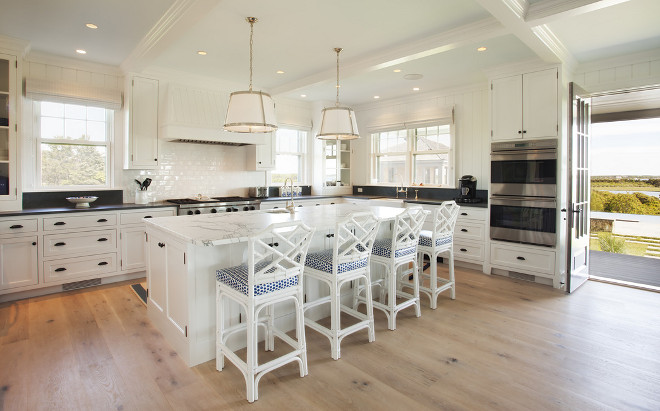 Beach house kitchen. Neutral Beach house kitchen with wide plank floors. Beach house kitchen #NeutralKitchen #Beachhouse #kitchen #Beachhousekitchen #neutralBeachHousekitchen Lynn Morgan Design.