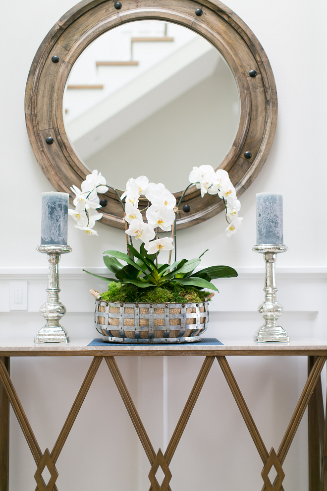 Foyer Console Table and Mirror. Foyer Interiors. I love how Trish Steele from Churchill Design decorates every room without overdoing it. She knows how to balance a space perfectly. #Foyer #consoletable #mirror #interiors #interiordesign #interiordesigner Churchill Design.