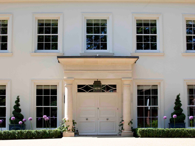 Traditional front entry door. This grand double Lincoln front door features a triple panel, a lantern above and polished chrome ironmongery. #Entry #door #frontdoor #traditional Hayburn & Co. 