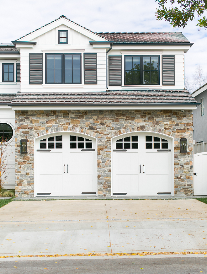 Garage Doors. Garage Door Hardware. Carriage House Style Garage Doors. Beautiful stone exterior surround the carriage house style garage doors. #GarageDoor #GarageDoors #GarageDoorHardware #carriagehousegaragedoors Brandon Architects, Inc. Churchill Design. Legacy CDM Inc.