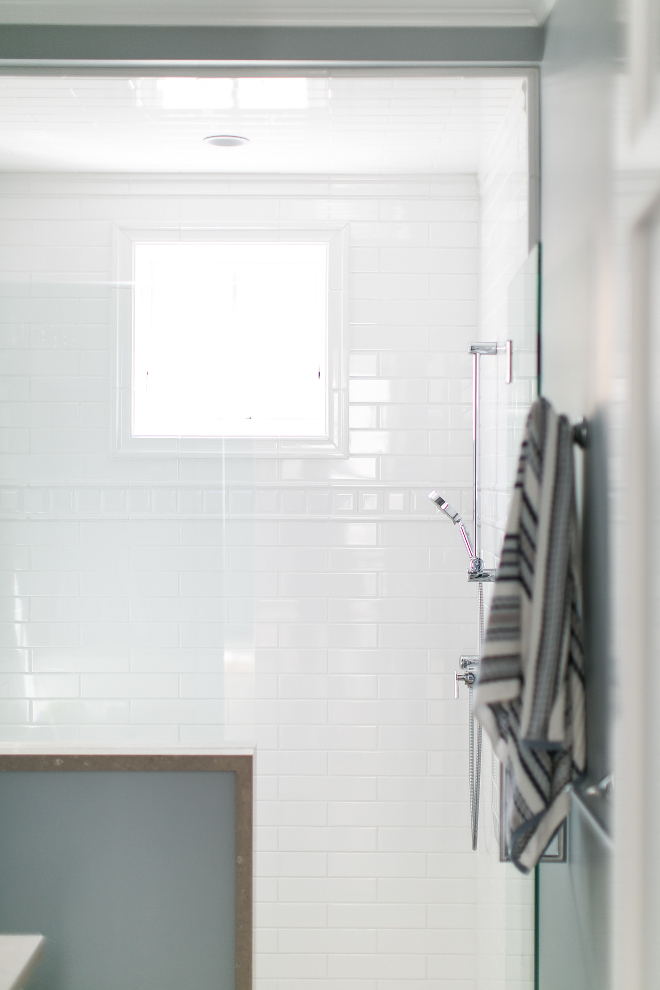 Shower tiles. The shower features only white tiles with different patterns. Great idea! #shower #tiles #whiteshower Churchill Design