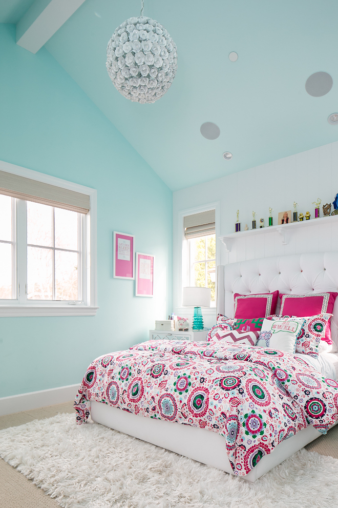 Turquoise Bedroom. bright bedroom carpet girls bedroom mint walls mirrored drawers pink bedding prints and patterns roman shades teal teen girls bedroom turquoise lamp vaulted ceiling white bed white headboard 