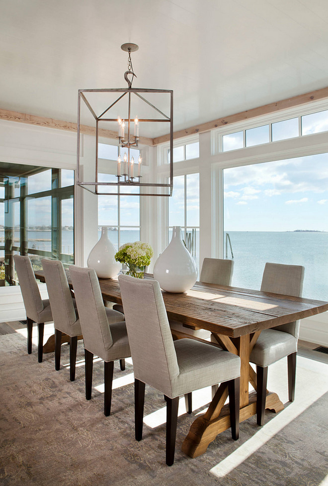 Dining room table and chairs. Farmhouse table in dining room. The table, dining chairs and lighting in this dining room are from Lillian August. #Diningroom #Table #chairs #furniture #lighting Michael Greenberg & Associates.