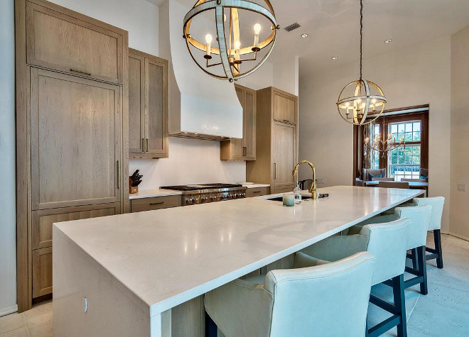 Kitchen neutral countertop and backplash. This kitchen uses the same neutral material for countertop and backplash, Bel Air Limestone. #Kitchen #NeutralCountertop #Neutralbacksplash #Countertop #Backsplash #BelAirLimestone #Limestone Scenic Sotheby's Realty. Interiors by Jan Ware Designs.