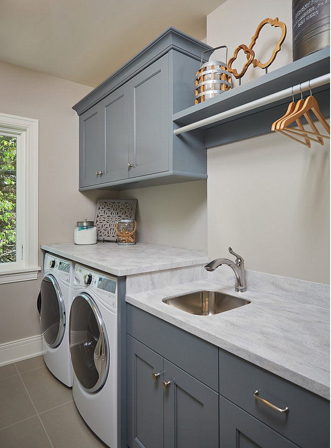 BM Grey Pinstripe. Laundry room cabinet paint color BM Grey Pinstripe. BM Grey Pinstripe is a dark grey with blue undertones. BM Grey Pinstripe #BMGreyPinstripe Mike Schaap Builders