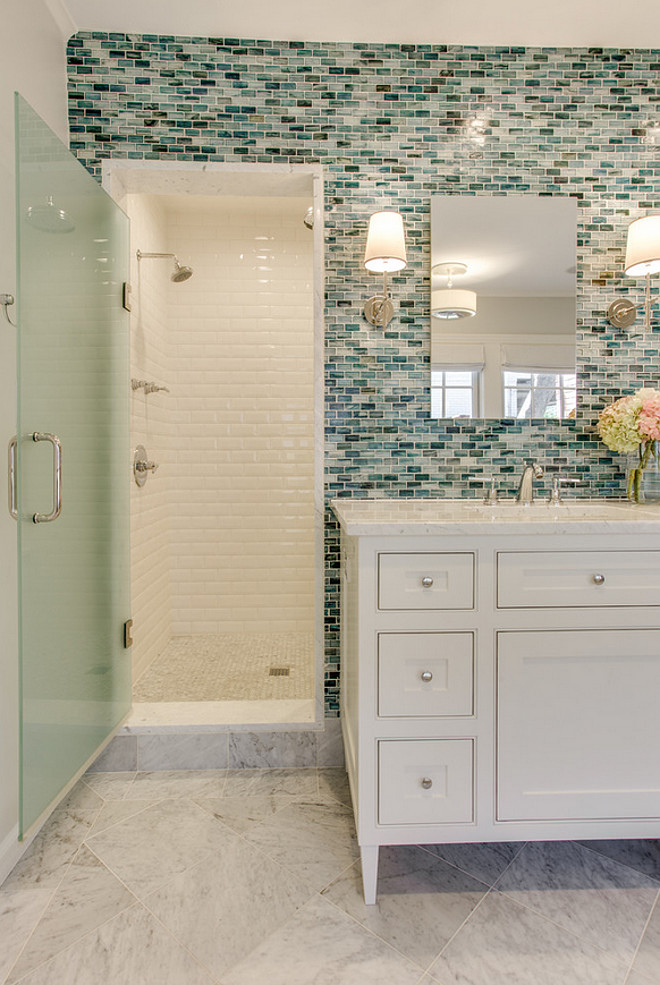 Bathroom tiles. Bathroom marble floor tiles, accent wall tile and beveled tile shower. #bathroom #bathroomtile #tile #floortile #walltile #tiling #beveledtile Redo