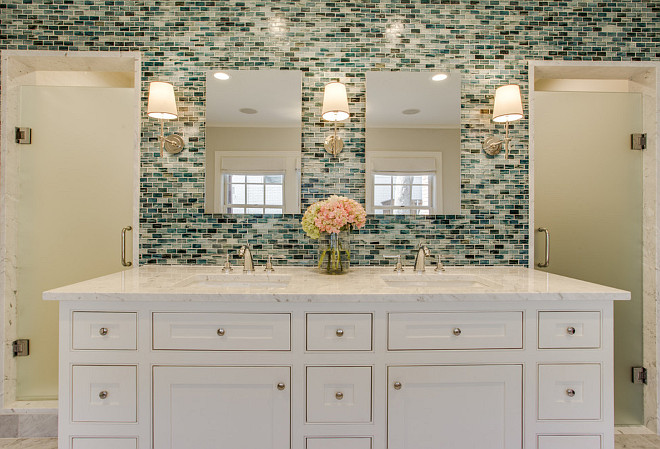 Batroom with His and Her Sinks & His & Her Showers. Bathroom with inset cabinet and tile accent wall. The wall tile is from Complete Tile Collection - Zumi Glass Tile. Bathroom with inset cabinet and tile accent wall ideas. #Bathroom #insetcabinet #tileaccentwall Redo